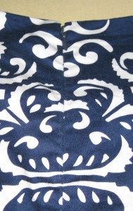 Matched at centre back seam with invisible zipper.