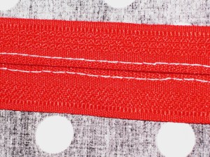 Underside of zipper.