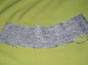 Outer edge of seam allowance of concave curve is pressed and stretched.