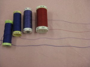 Threads arranged according to thickness - finest to heaviest. From left: Gutermann polyester topstitching Gutermann polyester all purpose Metrosene poly sheen embroidery Metrosene polyester all purpose