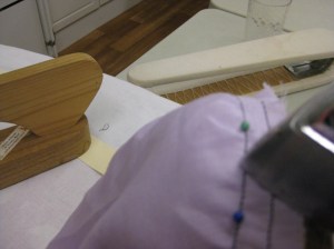 Steam the section being eased - do not allow the iron to touch the fabric.