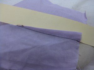 Place dart over ham with manilla card under the fold and press.