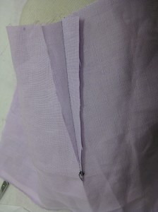 Dart slashed and pressed open will give a flatter garment surface in lined garment.