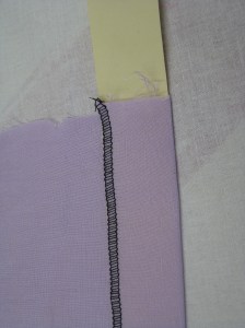 Using a manilla strip cut to the hem depth makes pressing an even hem allowance very easy.