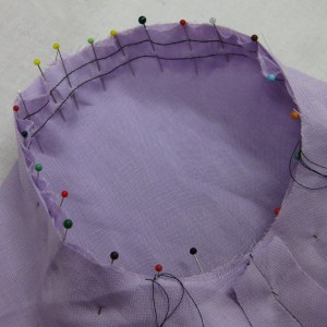 Pinned right on seam line from inside the sleeve.