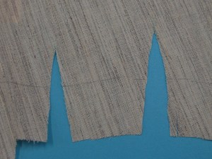 Dart sections of hair canvas removed to eliminate bulk.