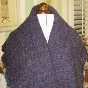 Upper collar placed over the pad-stitched under collar.  It now has good structure and appears much more like the photo of the original design.