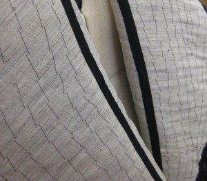Taped roll line will keep lapels in place.