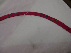 Use iron to steam and press a curve - allow to cool before applying to fabric