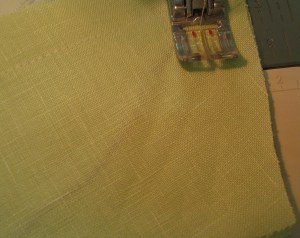 Stitching end of collar - thread is between upper and under collar pieces