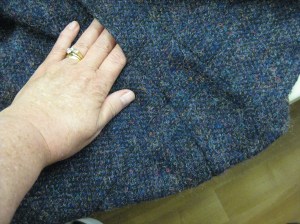 Sharp corner where side seam joins waist seam and side front