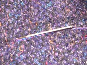 Snag tool does an excellent job of repairing any thread pulls as well as burying thread tails.