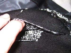 Return side of pleat removed to minimise bulk