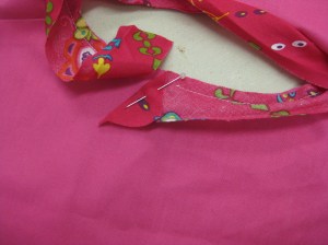 Start by folding leading end of trim at right angles to cut edge and start stitching