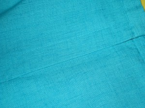 Fly zipper with cut on facing gives a flat finish with minimal bulk.