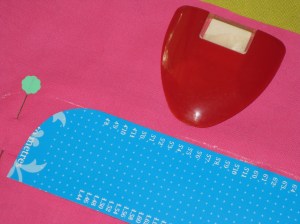 Turn work right side up and use template to chalk mark stitching line on front of garment.