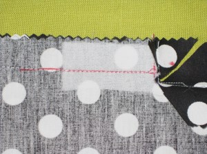 Stitch to close seam below zipper opening.