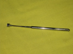Telescopic magnetic wand - great for finding and picking up needles and pins.
