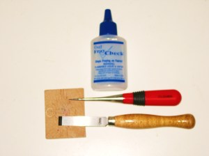 Buttonhole chisel and block; awl and Fray Check