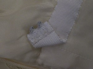 Rayon Petersham waist stay fastens around the waist to keep the skirt in place and take the strain of the zipper when it is being opened and closed.