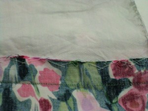 Seam allowances stitched to mid section fabric.