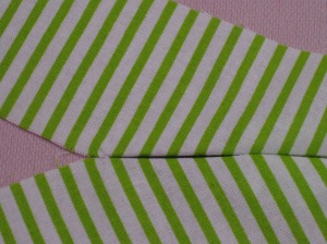 Fold buttonhole fabric so that it meets in centre of the hole.