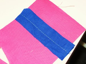 To make lips for faced method, stitch fabric strips right sides together with long straight stitch.