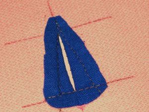 Remove tacking stitches and trim the shape.
