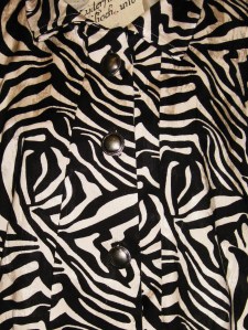 Front bands are wider at the hem and narrow towards the neckline.