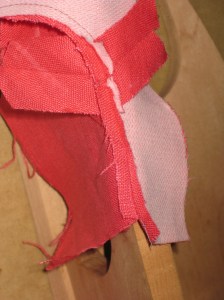 Place open seam along either a point presser or seam stick.