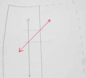 To draw a bias grain line, make a small 1"/2cm square box on the side of the existing grain line. Place ruler on opposite diagonal corners and draw a bias grain line.