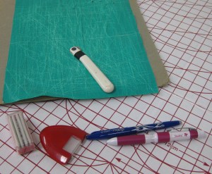 A selection of marking implements - dressmaker's carbon and tracing wheel; tailor's chalk and chalk wheel; Frixion pen and Sewline mechanical ceramic marking pencil