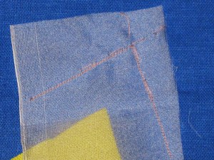 Place silk organza centred over pivot point keeping the straight grain of theorganza at a 90 degree angle to the pivot point.