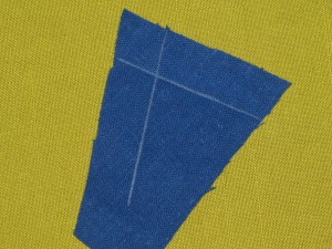 Mark sewing lines on piece to be inserted.