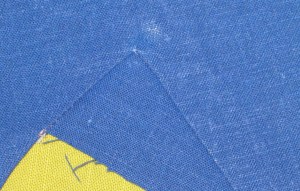 Seam allowances pressed away from corner.