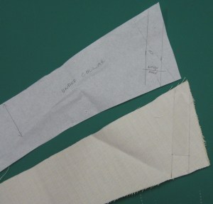 Mark position of collar stay and buttonhole on pattern and transfer stitching lines to right side of interfaced under collar.