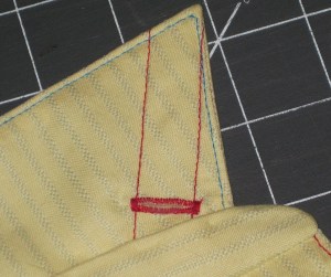 Collar stay pocket on under collar.