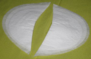 Straight shoulder edge pads - long end goes towards the front of the garment.