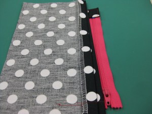 Position LHS of zipper under folded seam allowance