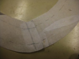 Overlap seam lines to make new facing pattern piece.