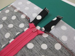 Underside when both sides of zipper stitched in place