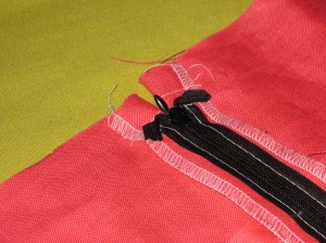 Stitch ends of tapes to seam allowances so they will not flap up.