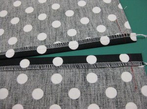 Key top of zipper placement