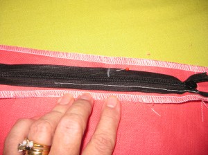 Line up the mark on the tape with the seam line and pin in place.