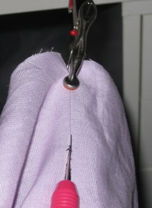 Seam opens ahead of the unpicker.