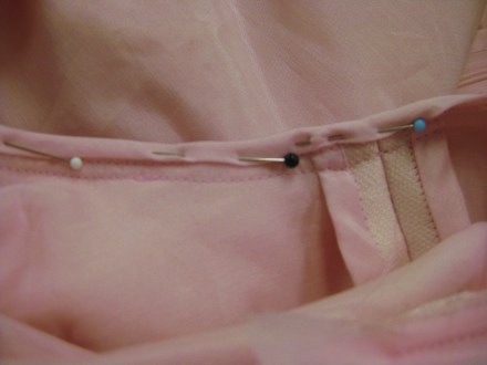 photo-12c-armhole-finding-folded-to-inside-of-sleeve-and-pinned-in-place